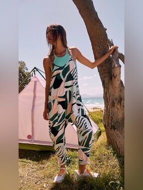 Free People Movement  FP Peached Ivory Hot Shot Jumpsuit Sz L